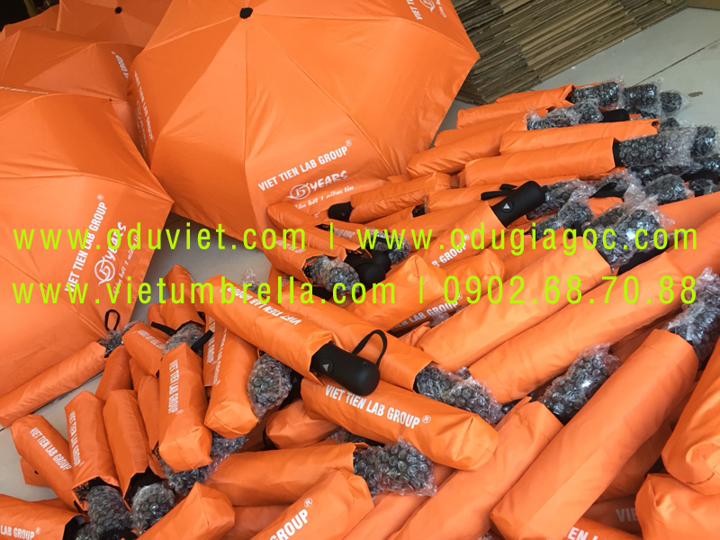 xưởng sản xuất ô dù cầm tay in logo quảng cáo